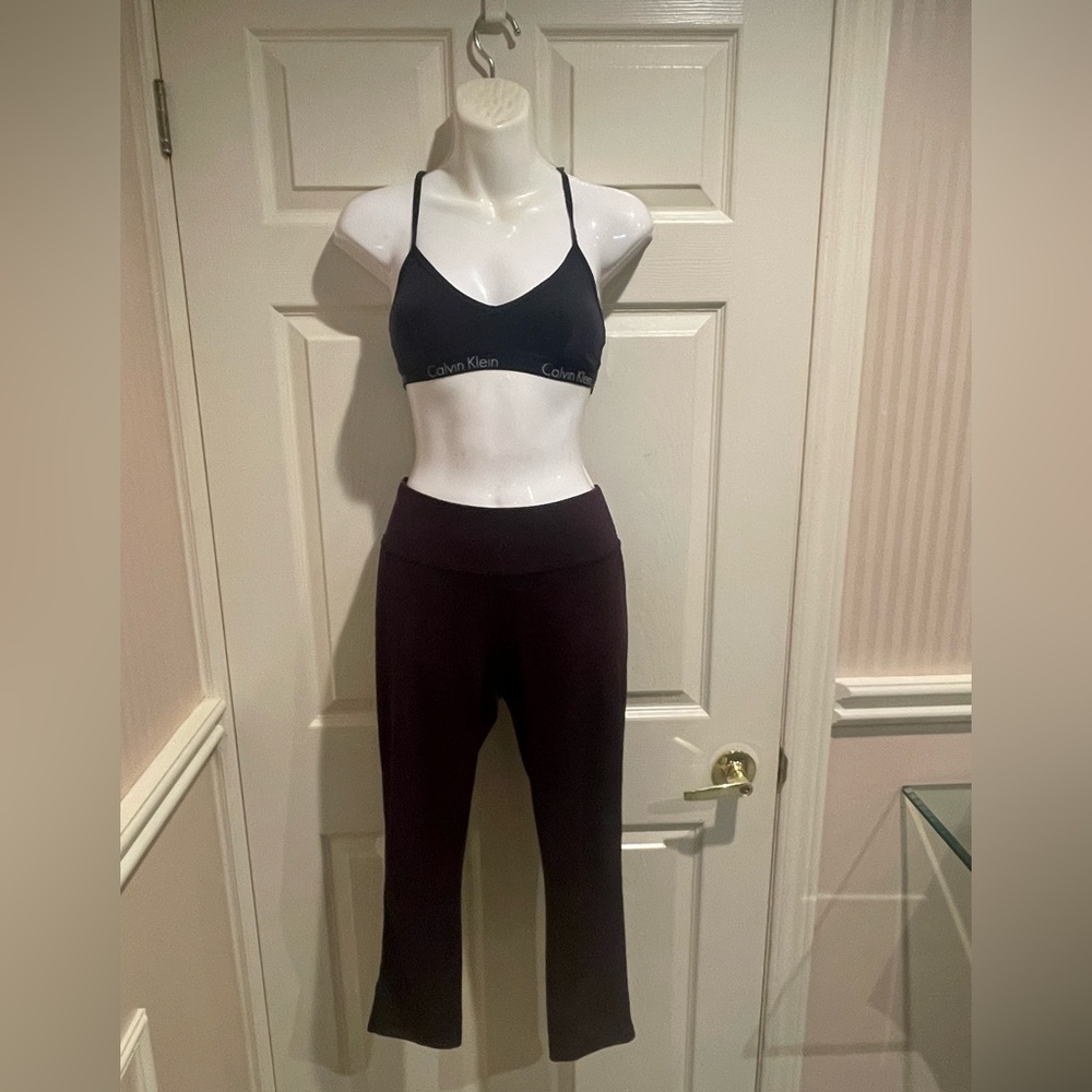 Bundled Calvin Klein Black bralette paired with athletic leggings Sleek Design